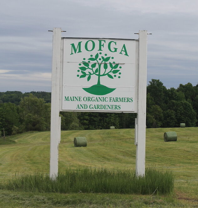 MOFGA sign in a hay field